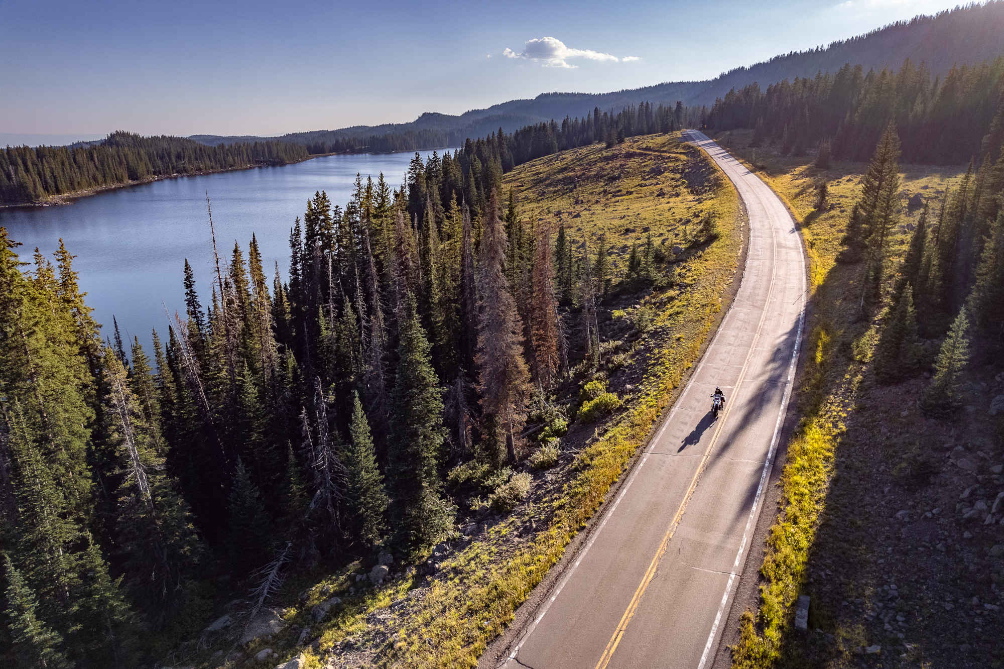 Motorcyclist riding in the wilderness