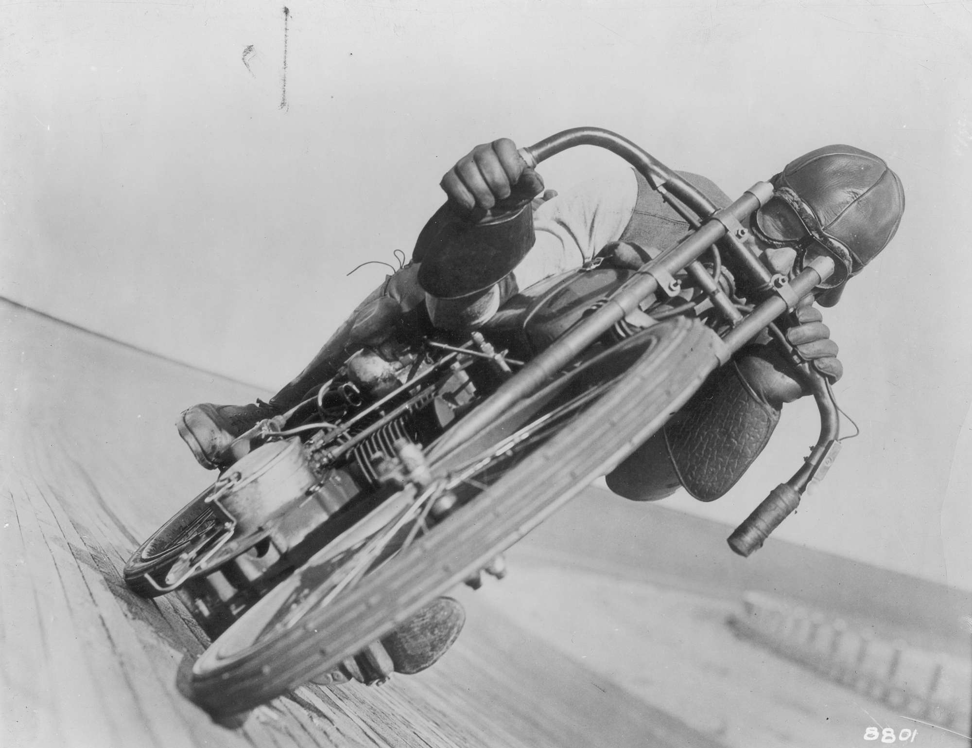 Otto Walker riding a motorcycle.