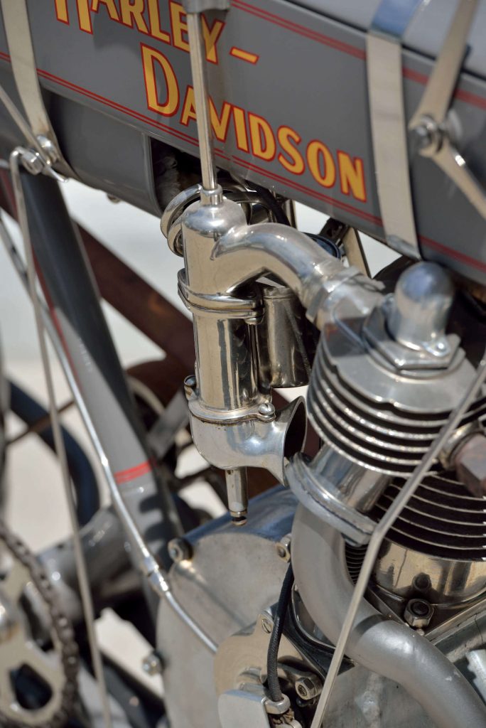 A close-up of a Harley-Davidson motorcycle from 1908.