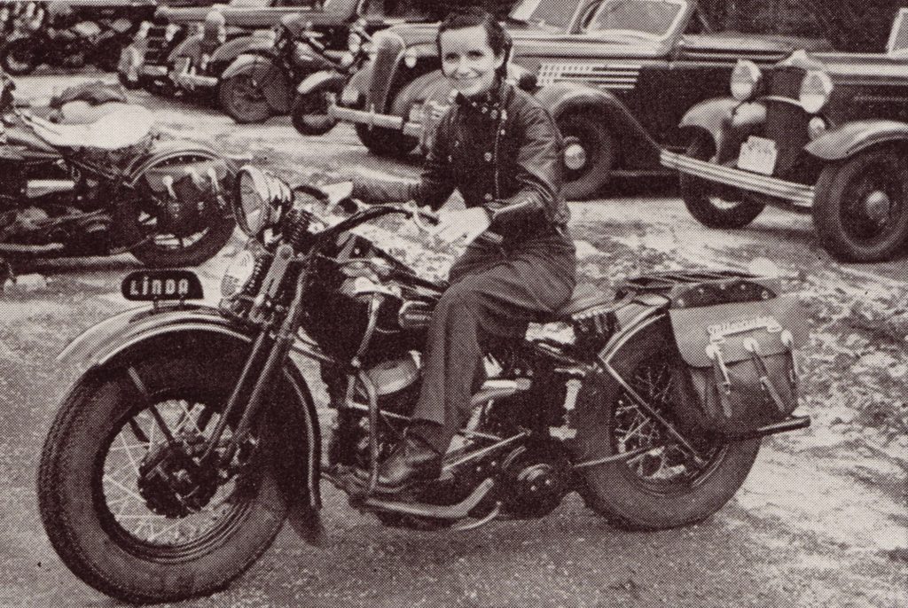 Linda Dugeau on a Harley-Davidson.