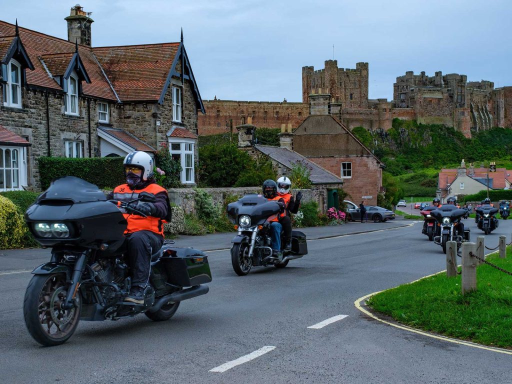 Waving from their Harley