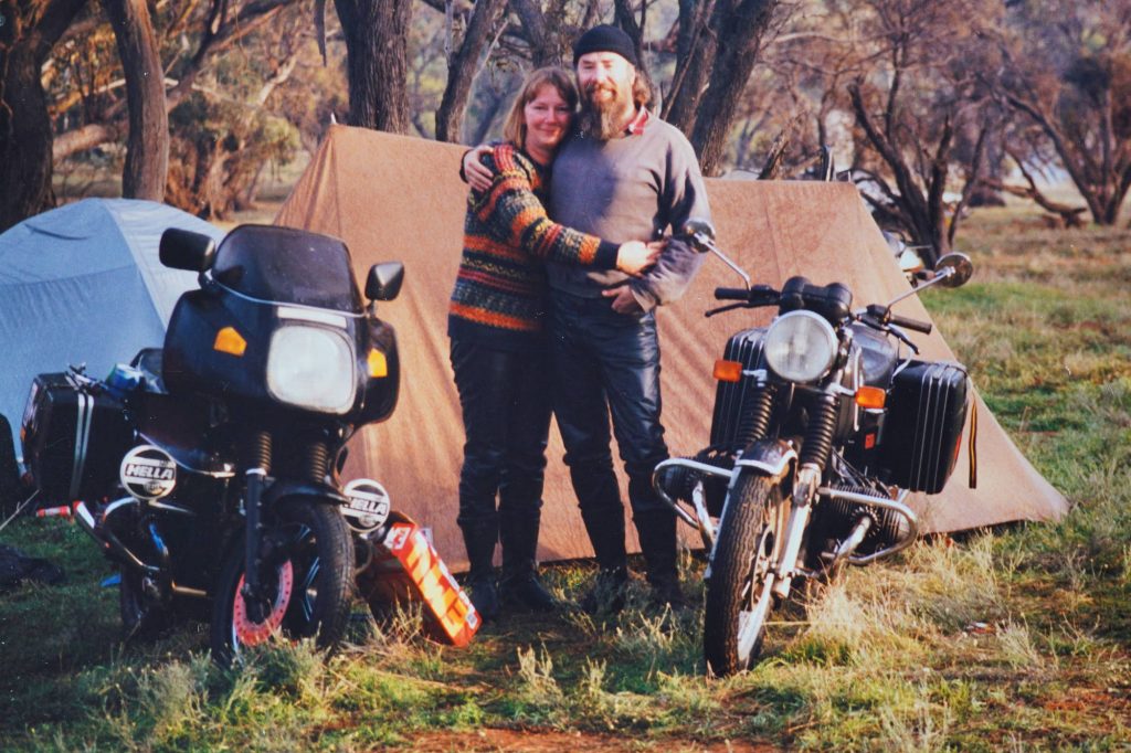 A picture of a younger Bob and Chris standing with their motorcycles.