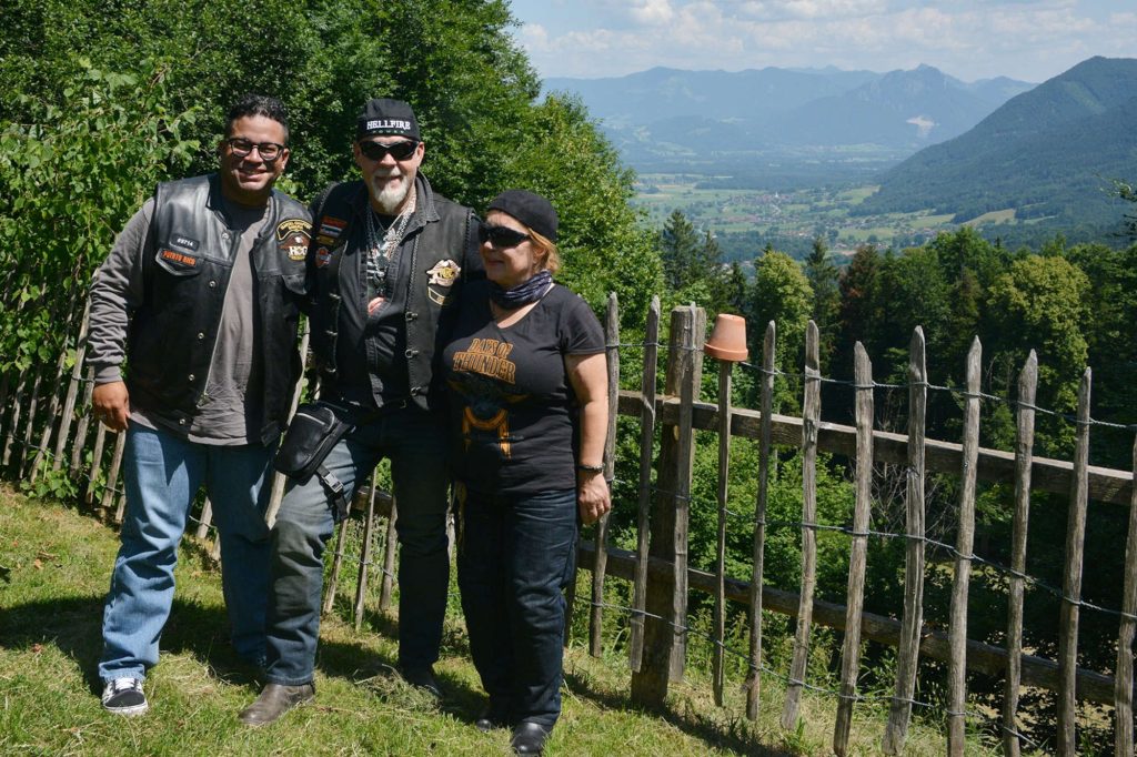 H.O.G. members in a field.