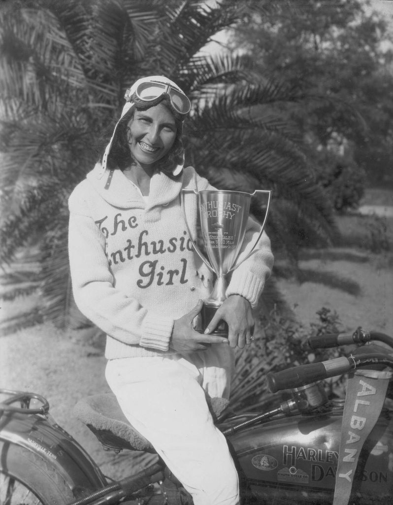 Vivian Bales holding a trophy.