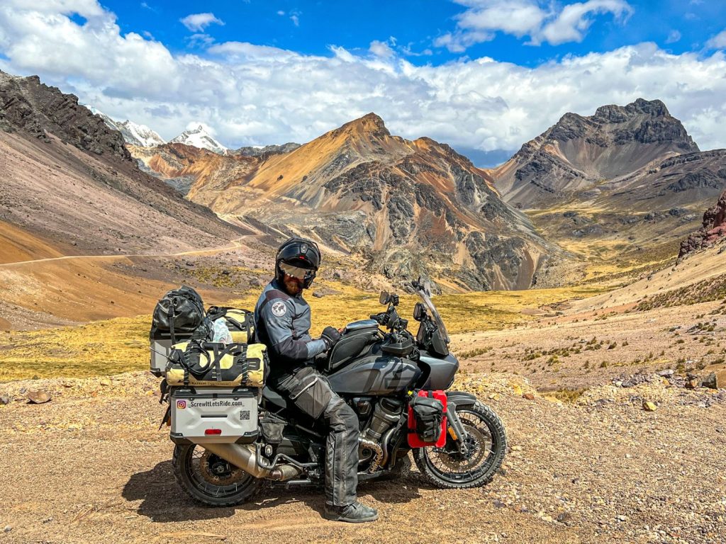 Greg Kedzior on his motorcycle in rocky terrain in Peru