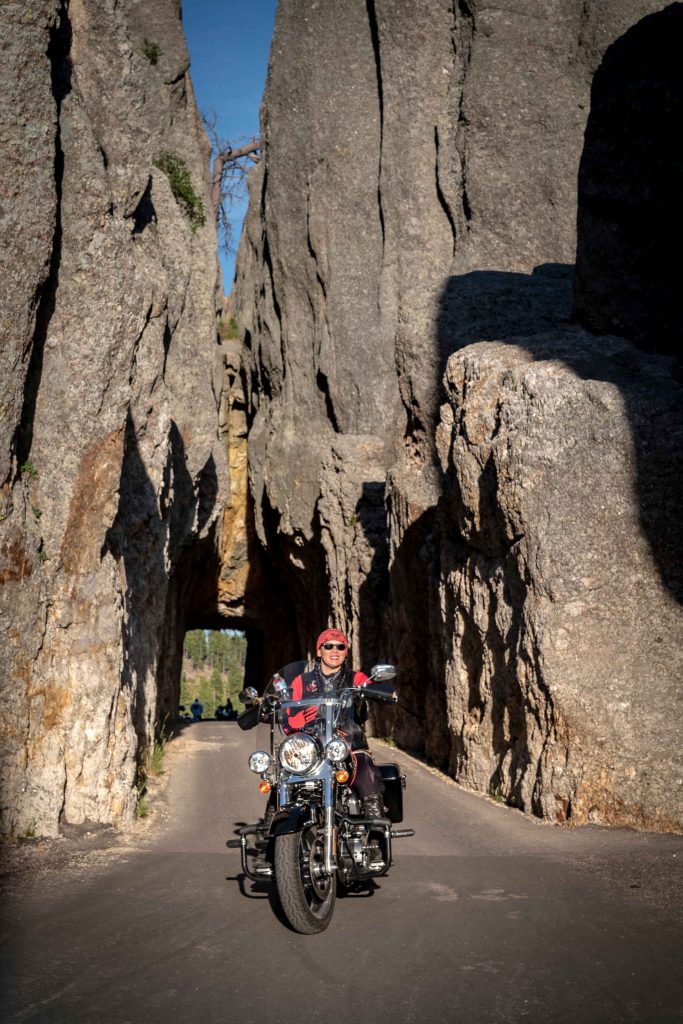 Motorcyclist riding out in the mountains