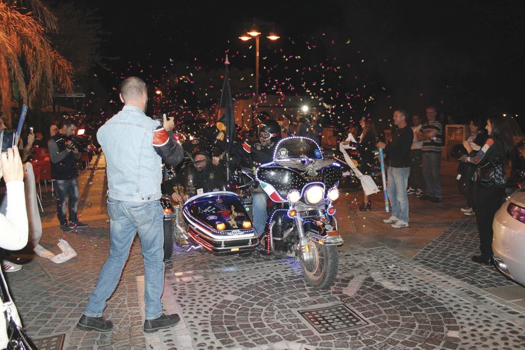 A Harley-Davidson decorated with lights.