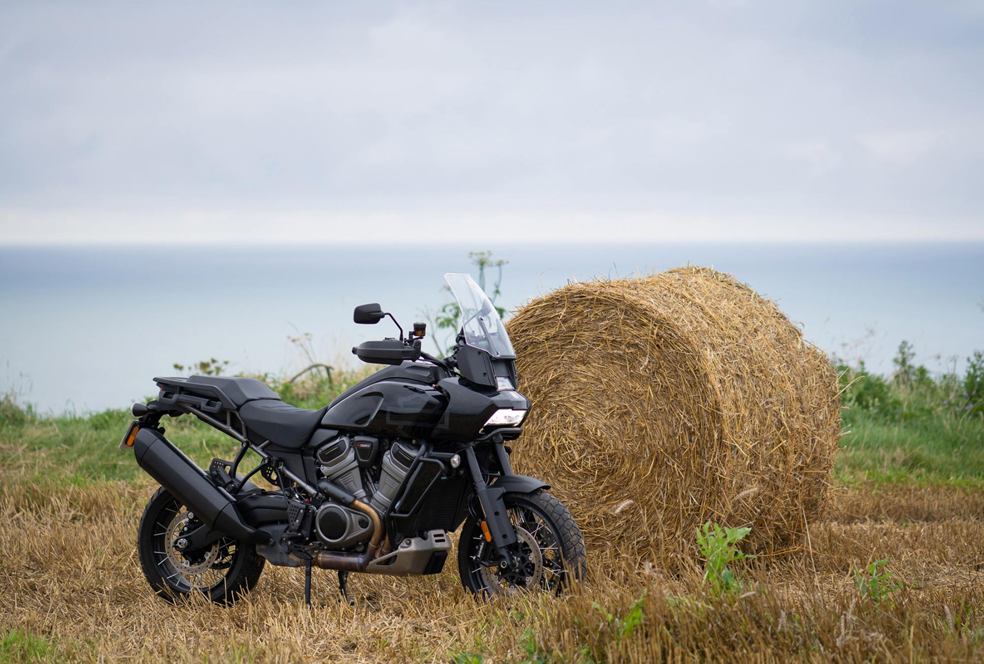 Harley-Davidson Pan America in front of a bale of hay