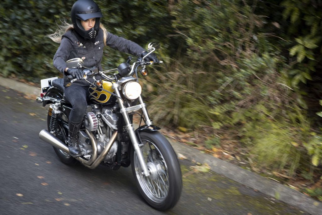 Laura riding her Harley-Davidson
