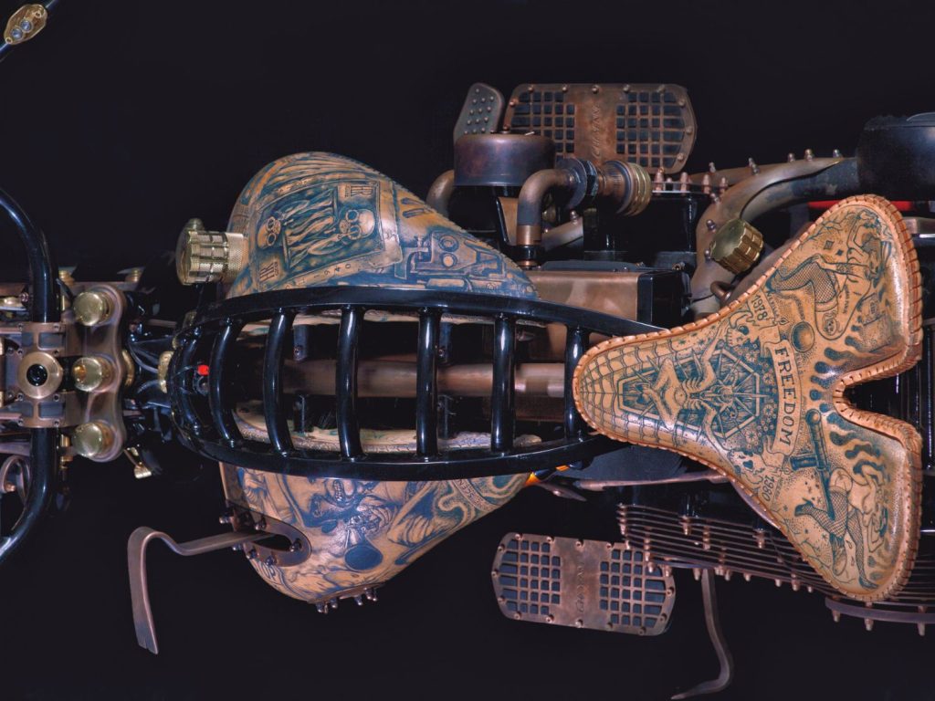 Tattooed leatherwork on a Harley-Davidson.