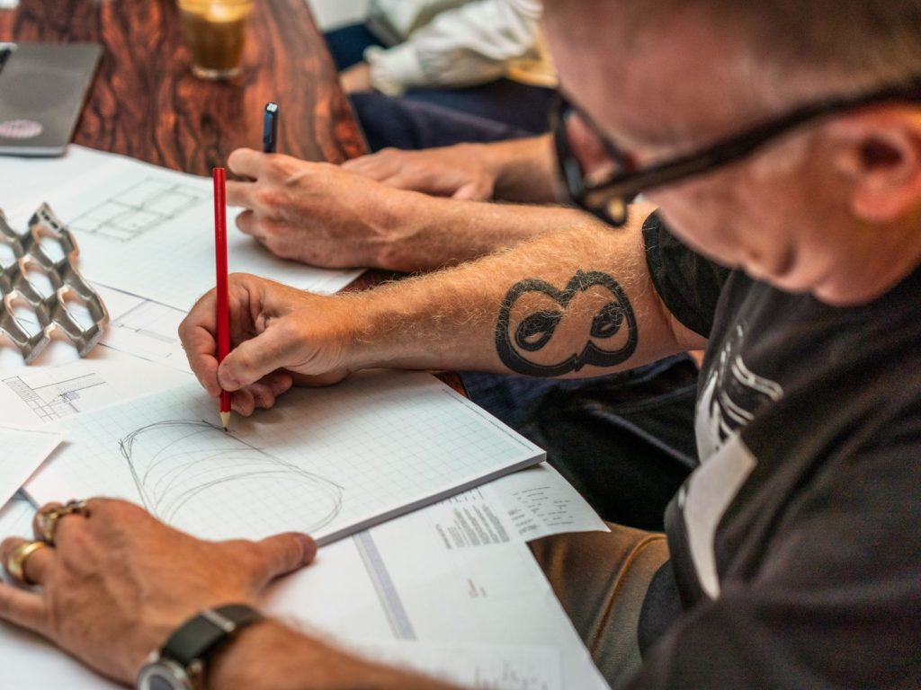 Adam Brinkworth at work with his design team.