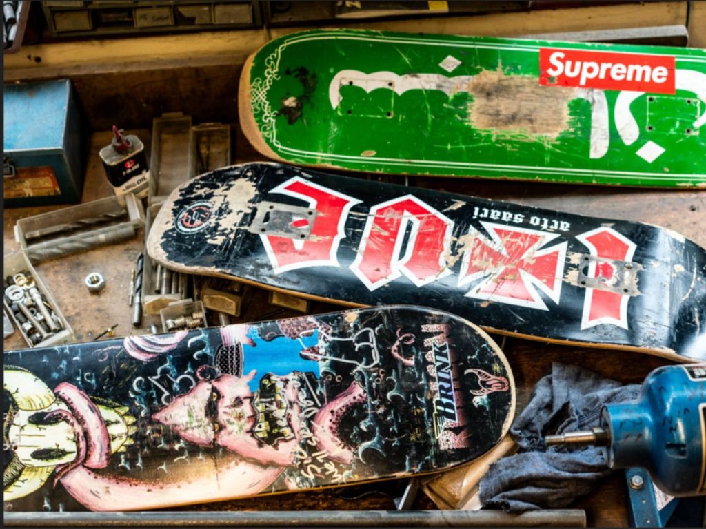 Battered skateboards in Adam Brinkworth's studio.